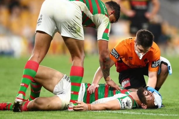 Josh Mansour of the Rabbitohs receives treatment for a cut to the head during the round 23 NRL match between the Penrith Panthers and the South...