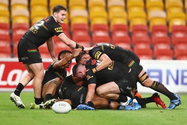 Apisai Koroisau of the Panthers celebrates scoring a try with team mates during the round 23 NRL match between the Penrith Panthers and the South...
