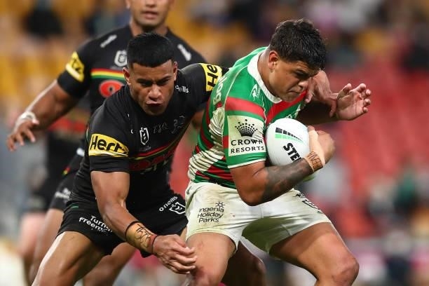 Latrell Mitchell of the Rabbitohs is tackled during the round 23 NRL match between the Penrith Panthers and the South Sydney Rabbitohs at Suncorp...