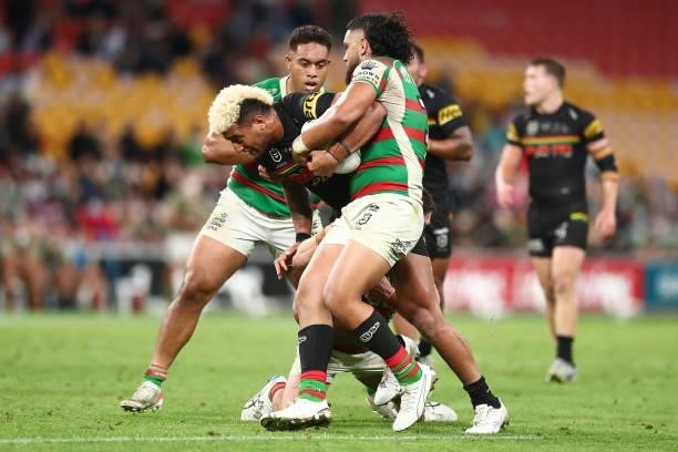 Viliame Kikau of the Panthers is tackled during the round 23 NRL match between the Penrith Panthers and the South Sydney Rabbitohs at Suncorp...