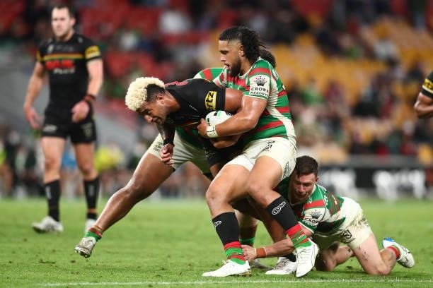 Viliame Kikau of the Panthers is tackled during the round 23 NRL match between the Penrith Panthers and the South Sydney Rabbitohs at Suncorp...
