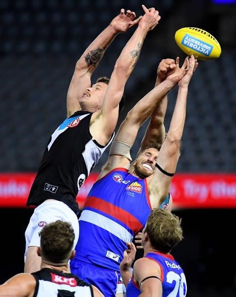 Marcus Bontempelli of the Bulldogs competes in the air during the round 23 AFL match between Western Bulldogs and Port Adelaide Power at Marvel...