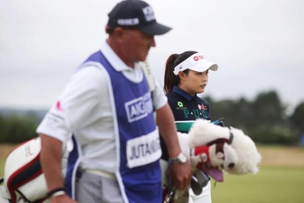 Moriya Jutanugarn of Thailand walks with her caddie on the fourteenth hole during Day Two of the AIG Women's Open at Carnoustie Golf Links on August...