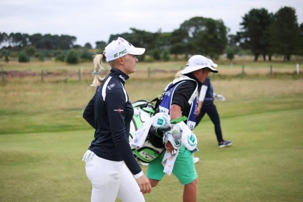Madelene Sagstrom of Sweden and her caddie walk on the seventh hole during Day Two of the AIG Women's Open at Carnoustie Golf Links on August 20,...