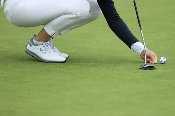 Madelene Sagstrom of Sweden marks her ball on the seventh green during Day Two of the AIG Women's Open at Carnoustie Golf Links on August 20, 2021 in...