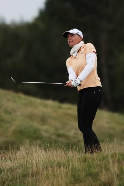 Perrine Delacour of France plays a chip shot onto the thirteenth green during Day Two of the AIG Women's Open at Carnoustie Golf Links on August 20,...