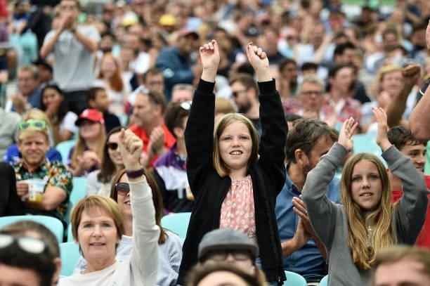 Fans react in the crowd during the Eliminator match of The Hundred between Oval Invincibles Women and Birmingham Phoenix Women at The Kia Oval on...
