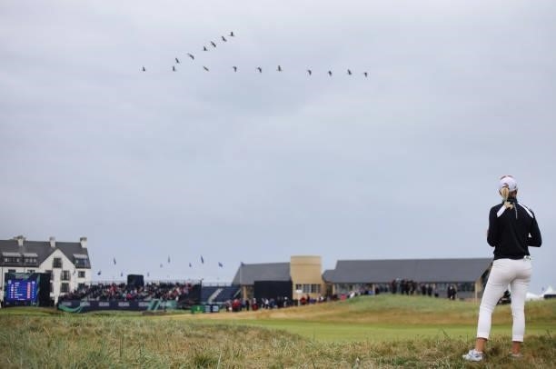 Madelene Sagstrom of Sweden looks on from the eighteenth hole as birds fly over the course during Day Two of the AIG Women's Open at Carnoustie Golf...