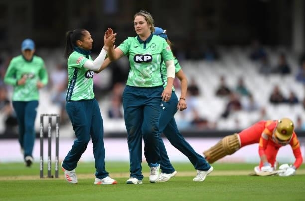 Oval bowler Dane van Niekerk is congratulated by Shabnim Ismail after dismissing Phoenix batter Marie Kelly during the Eliminator match of The...