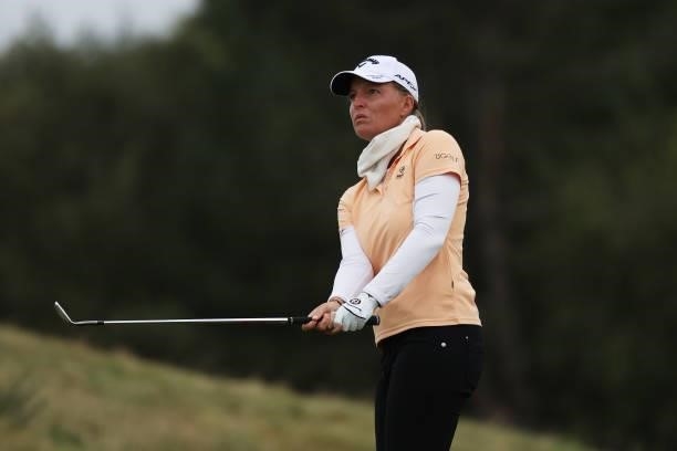 Perrine Delacour of France plays a chip shot onto the thirteenth green during Day Two of the AIG Women's Open at Carnoustie Golf Links on August 20,...