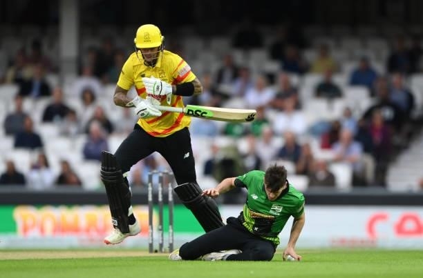 Brave bowler George Garton collides with Rockets batter Alex Hales as he scampers a quick single during the Eliminator match of The Hundred between...