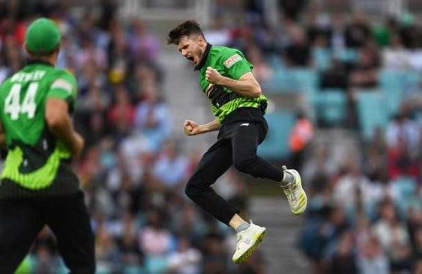George Garton of Southern Brave Men celebrates after taking the wicket of Dawid Malan of Trent Rockets Men during the Eliminator match of The Hundred...