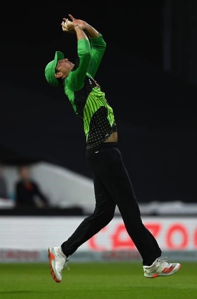 Tim David of Southern Brave Men takes a catch to dismiss Rashid Khan of Trent Rockets Men during the Eliminator match of The Hundred between Southern...