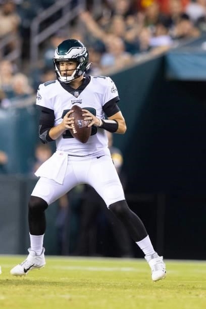 Nick Mullens of the Philadelphia Eagles looks to pass the ball against the New England Patriots in the preseason game at Lincoln Financial Field on...