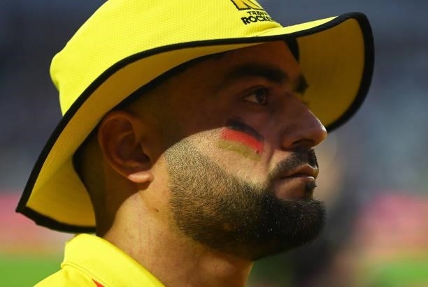 Rashid Khan of Trent Rockets Men looks on with the colours of the Afghanistan flag painted onto their face during the Eliminator match of The Hundred...