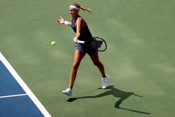 Petra Kvitova of Czech Republic returns a shot to Angelique Kerber of Germany during the Western & Southern Open at Lindner Family Tennis Center on...