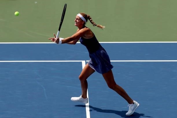 Petra Kvitova of Czech Republic returns a shot to Angelique Kerber of Germany during the Western & Southern Open at Lindner Family Tennis Center on...