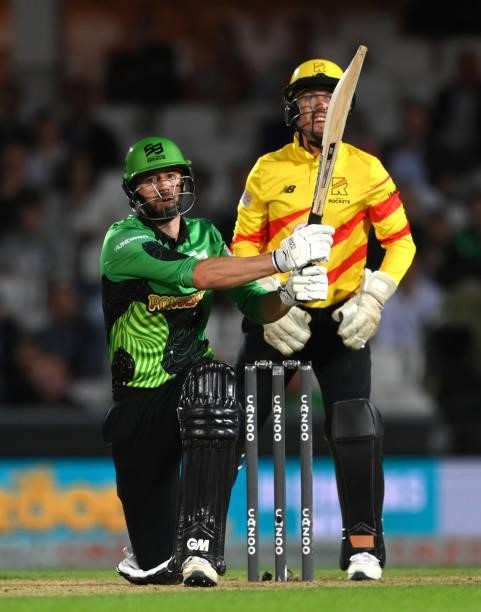 Rockets wicketkeeper Tom Moores looks on as Brave batter James Vince hits out for 6 runs during the Eliminator match of The Hundred between Southern...