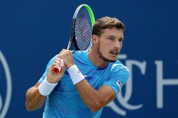 Pablo Carreno Busta of Spain plays a backhand during his match against Daniil Medvedev of Russia during Western & Southern Open - Day 6 at the...