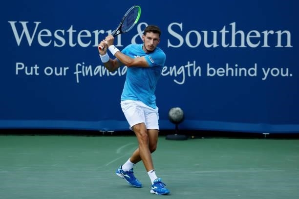 Pablo Carreno Busta of Spain plays a backhand during his match against Daniil Medvedev of Russia during Western & Southern Open - Day 6 at the...