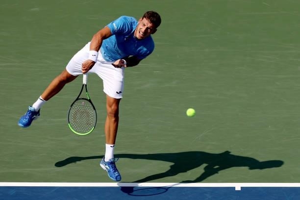 Pablo Carreno Busta of Spain serves to Daniil Medvedev of Russia during the Western & Southern Open at Lindner Family Tennis Center on August 20,...