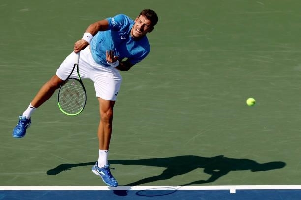 Pablo Carreno Busta of Spain serves to Daniil Medvedev of Russia during the Western & Southern Open at Lindner Family Tennis Center on August 20,...
