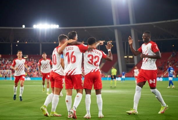 Lucas Robertone of UD Almeria celebrates with team mates after scoring his team's second goal during the LaLiga Smartbank match between UD Almería...