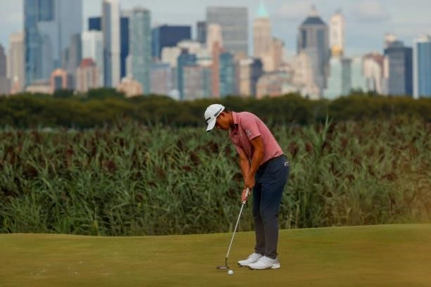 Collin Morikawa of the United States putts on the 14th green during the second round of THE NORTHERN TRUST, the first event of the FedExCup Playoffs,...