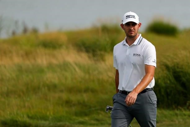Patrick Cantlay of the United States walks to the 14th green during the second round of THE NORTHERN TRUST, the first event of the FedExCup Playoffs,...