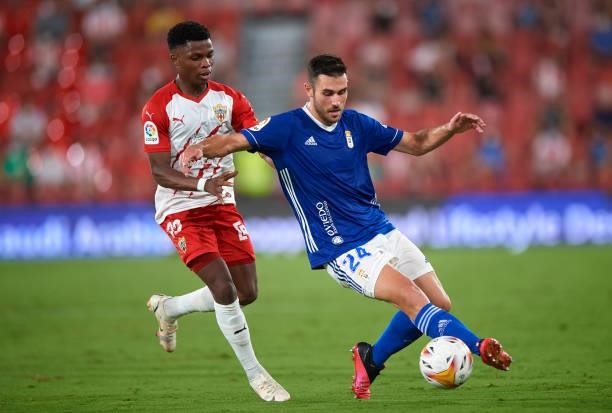 Largie Ramazani of UD Almeria competes for the ball with Lucas Ahijado Quintana of Real Oviedo during the LaLiga Smartbank match between UD Almería...