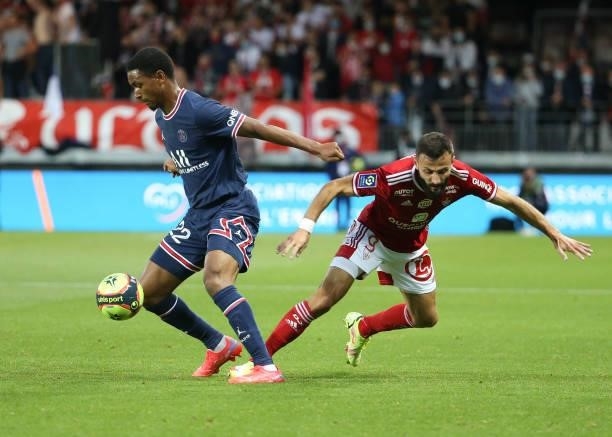 Abdou Diallo of PSG, Franck Honorat of Brest during the Ligue 1 match between Stade Brestois 29 and Paris Saint-Germain at Stade Francis Le Ble on...