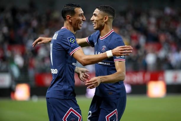 Angel Di Maria of PSG celebrates his goal with Achraf Hakimi during the Ligue 1 match between Stade Brestois 29 and Paris Saint-Germain at Stade...