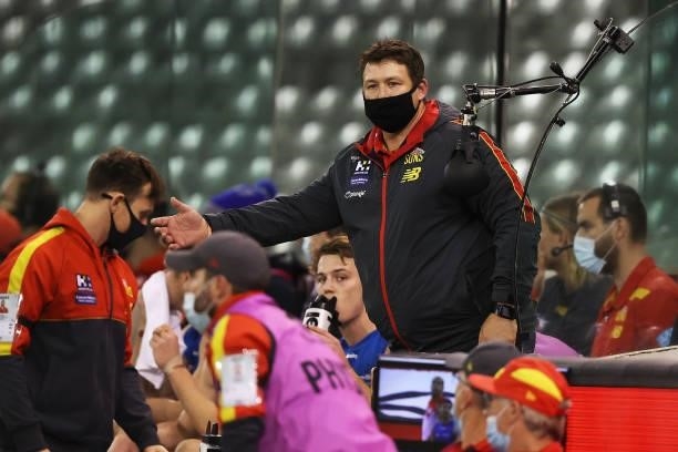 Suns head coach Stuart Dew reacts during the round 23 AFL match between Sydney Swans and Gold Coast Suns at Marvel Stadium on August 21, 2021 in...