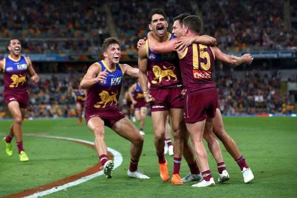 Charlie Cameron of the Lions celebrates a goal at the horn during the round 23 AFL match between Brisbane Lions and West Coast Eagles at The Gabba on...