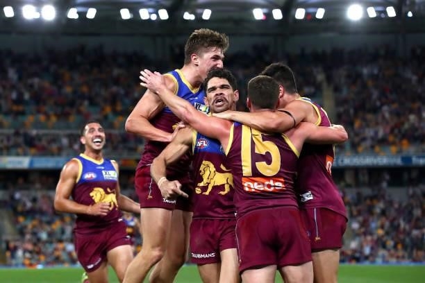 Charlie Cameron of the Lions celebrates a goal at the horn during the round 23 AFL match between Brisbane Lions and West Coast Eagles at The Gabba on...