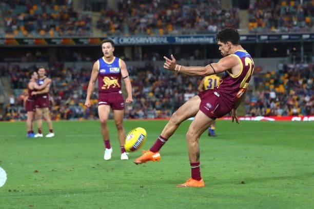 Charlie Cameron of the Lions kicks a goal at the horn during the round 23 AFL match between Brisbane Lions and West Coast Eagles at The Gabba on...