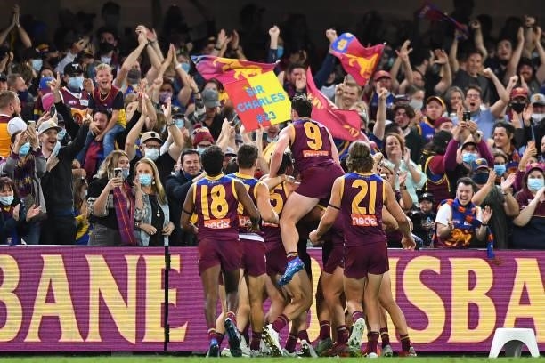 Brisbane Lions celebrate victory during the round 23 AFL match between the Brisbane Lions and the West Coast Eagles at The Gabba on August 21, 2021...