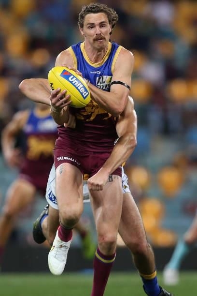 Joe Daniher of the Lions marks the ball during the round 23 AFL match between Brisbane Lions and West Coast Eagles at The Gabba on August 21, 2021 in...