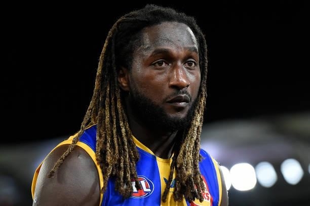 Nic Naitanui of the Eagles walks off the field after his team's defeat during the round 23 AFL match between the Brisbane Lions and the West Coast...
