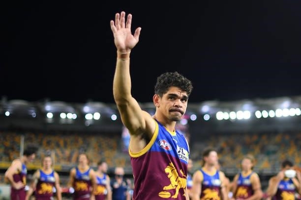 Charlie Cameron of the Lions gestures to fans after his team's victory during the round 23 AFL match between the Brisbane Lions and the West Coast...