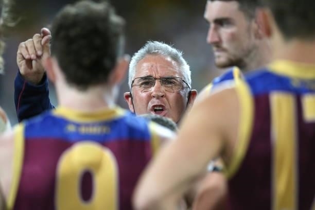 Lions coach Chris Fagan talks to his players during the round 23 AFL match between Brisbane Lions and West Coast Eagles at The Gabba on August 21,...