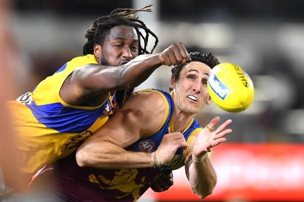 Nic Naitanui of the Eagles and Oscar McInerney of the Lions compete for the ball during the round 23 AFL match between the Brisbane Lions and the...