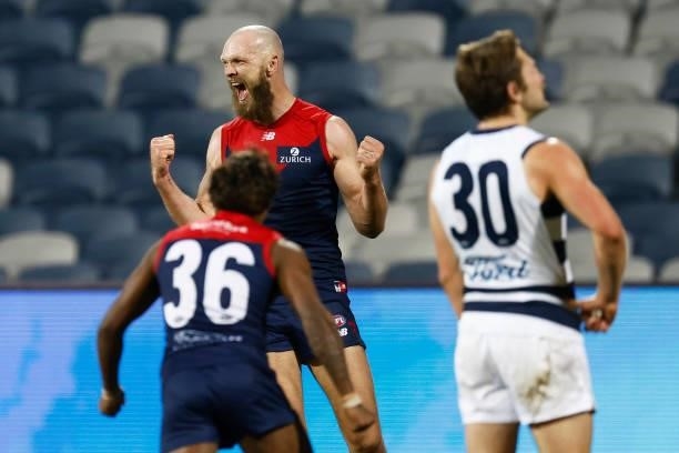 Max Gawn of the Demons celebrates after kicking a goal after the siren to win the round 23 AFL match between Geelong Cats and Melbourne Demons at...