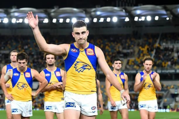 Elliott Yeo leads West Coast Eagles off the field after their defeat during the round 23 AFL match between the Brisbane Lions and the West Coast...