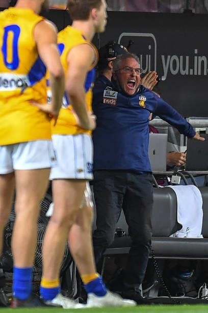 Brisbane Lions coach Chris Fagan celebrates at the final whistle during the round 23 AFL match between the Brisbane Lions and the West Coast Eagles...