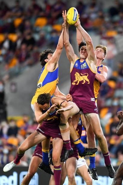 Oscar McInerney of the Lions competes for the ball during the round 23 AFL match between the Brisbane Lions and the West Coast Eagles at The Gabba on...