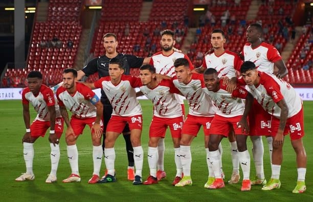 Players of UD almeria line up for a team photo prior to during the LaLiga Smartbank match between UD Almería and Real Oviedo at Municipal de Los...