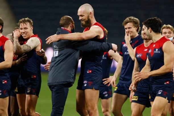 Demons head coach Simon Goodwin hugs Max Gawn of the Demons after winning the round 23 AFL match between Geelong Cats and Melbourne Demons at GMHBA...