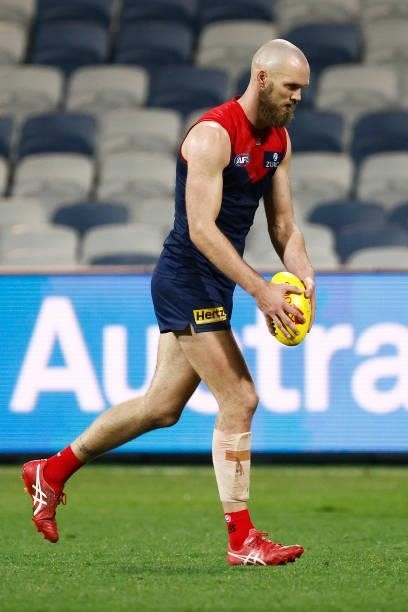 Max Gawn of the Demons comes in to kick a goal after the final siren during the round 23 AFL match between Geelong Cats and Melbourne Demons at GMHBA...
