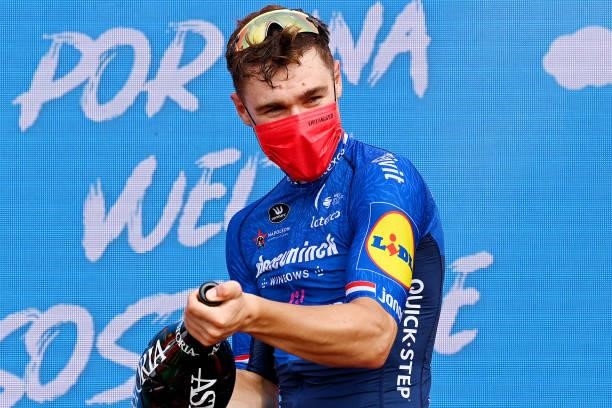 Fabio Jakobsen of Netherlands and Team Deceuninck - Quick-Step celebrates winning the stage on the podium ceremony after during the 76th Tour of...